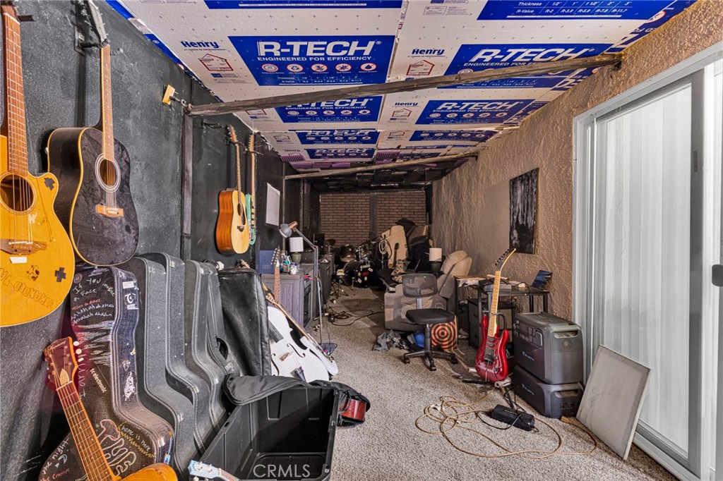 15471 Washoan Road Apple Valley, CA 92307 - Photo 23 of 38 a view of a room with gym equipment
