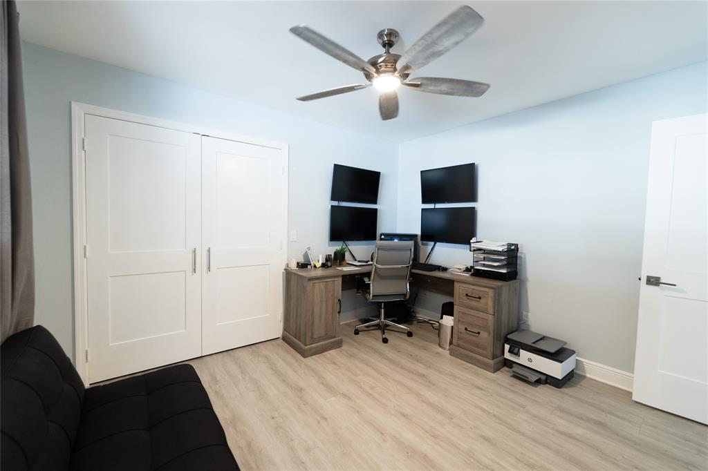 1497 Southwest Buckskin Trail Stuart, FL 34997 - Photo 27 of 48 a view of a workspace with furniture and a window