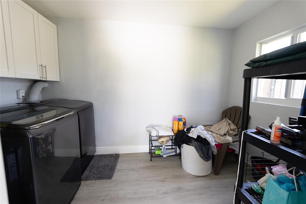 1497 Southwest Buckskin Trail Stuart, FL 34997 - Photo 29 of 48 a view of a storage and utility room