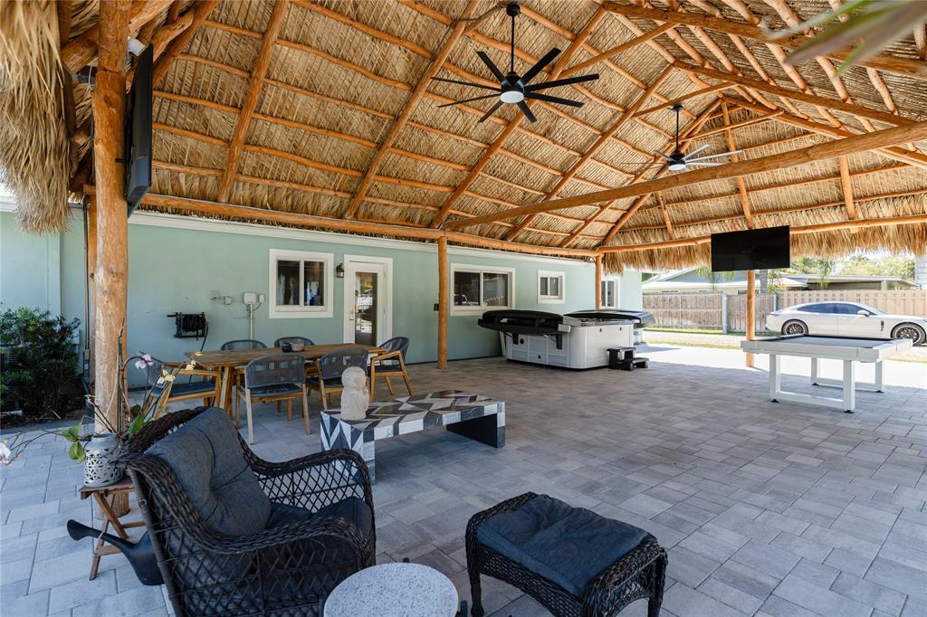 1497 Southwest Buckskin Trail Stuart, FL 34997 - Photo 36 of 48 a living room with furniture and a couch