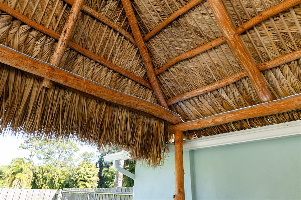 1497 Southwest Buckskin Trail Stuart, FL 34997 - Photo 45 of 48 a view of a backyard with plants
