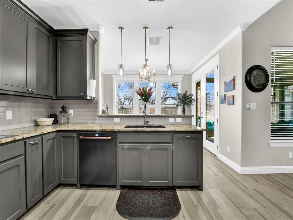 5418 Wedgefield Road Granbury, TX 76049 - Photo 11 of 40 Kitchen with freshly painted cabinets
