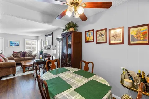 a bed room with furniture and a dining table