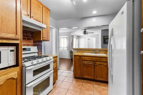 a kitchen with a stove and a sink