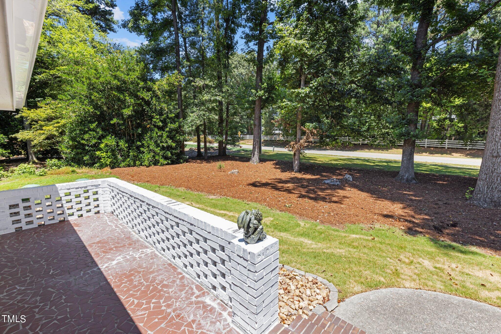 8809 Leesville Road Raleigh, NC 27613 - Photo 28 of 32 a view of an outdoor space and yard