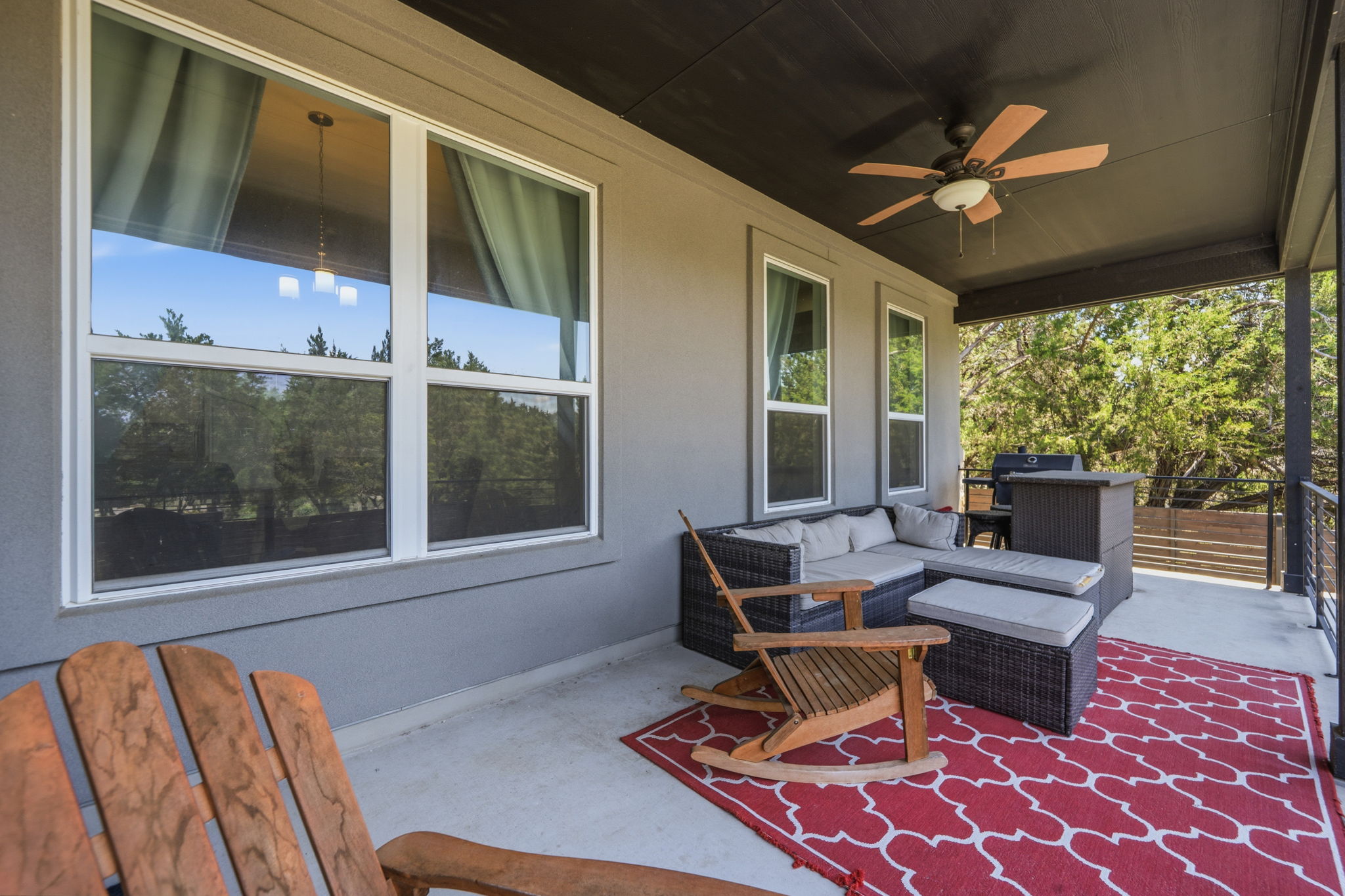18605 Masters Cove Point Venture, TX 78645 - Photo 28 of 40 Covered patio featuring a concrete floor, dark ceiling, and a ceiling fan