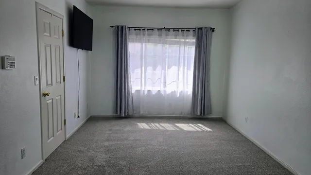 an empty room with windows