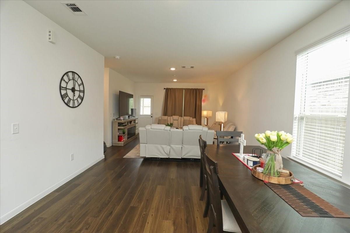 14463 Cedar Br Lane Conroe, TX 77302 - Photo 11 of 50 a living room with furniture and a potted plant