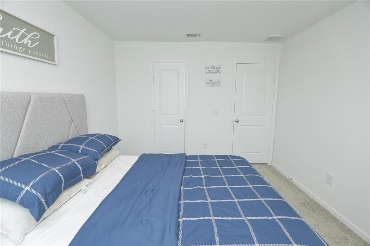 14463 Cedar Br Lane Conroe, TX 77302 - Photo 36 of 50 a view of a livingroom with furniture and staircase