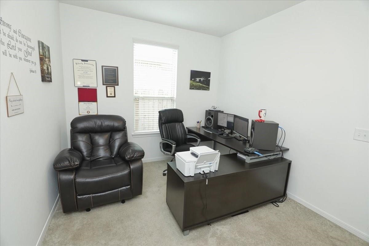 14463 Cedar Br Lane Conroe, TX 77302 - Photo 41 of 50 a living room with furniture and a window