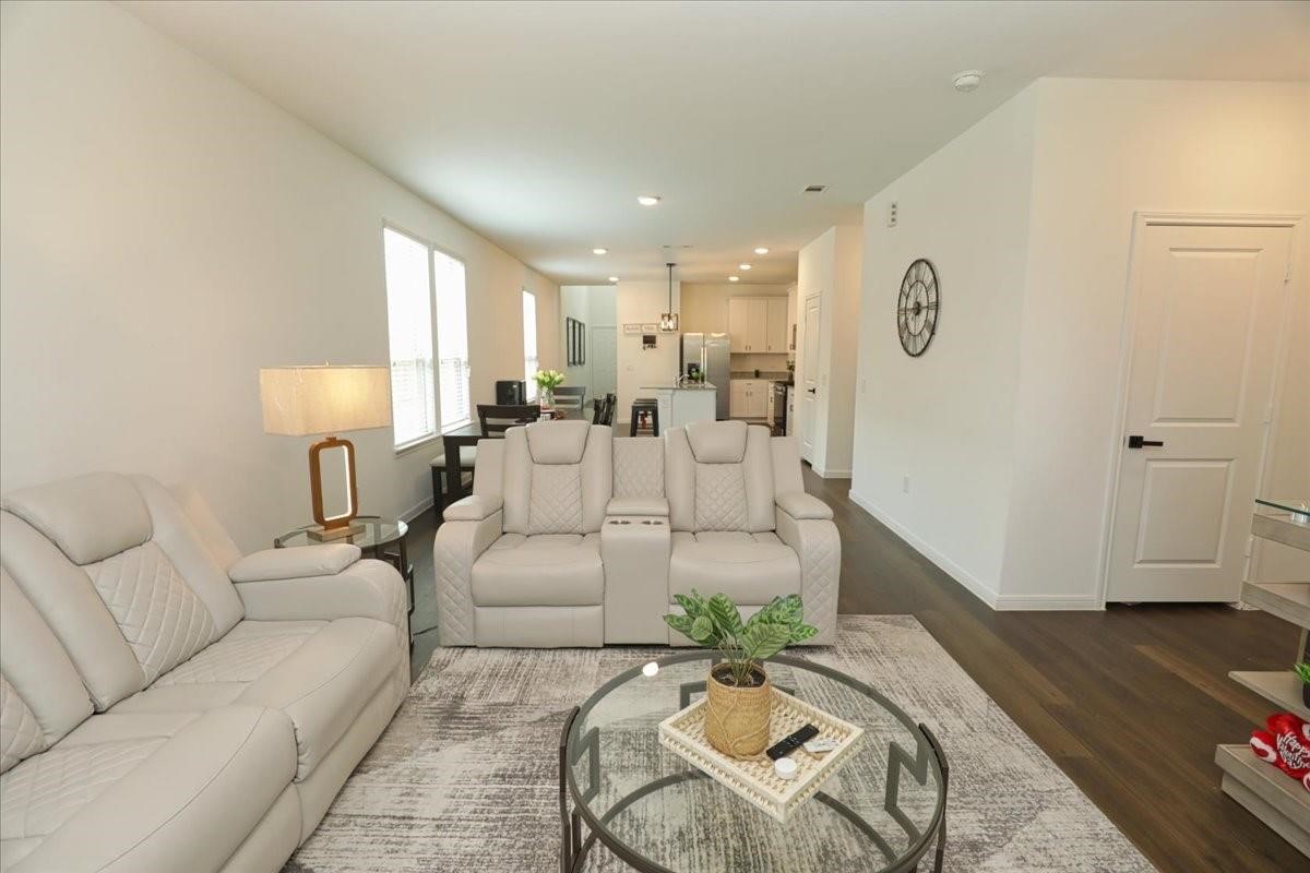 14463 Cedar Br Lane Conroe, TX 77302 - Photo 10 of 50 a living room with furniture and a wooden floor
