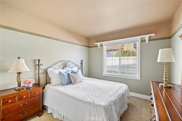 a view of a patio with a table chairs and a patio