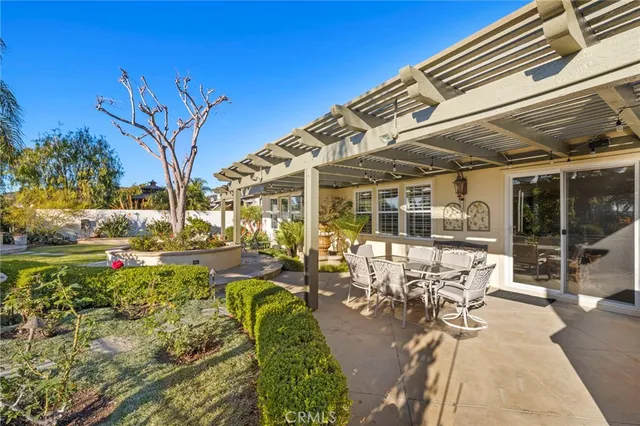 a view of swimming pool with chairs