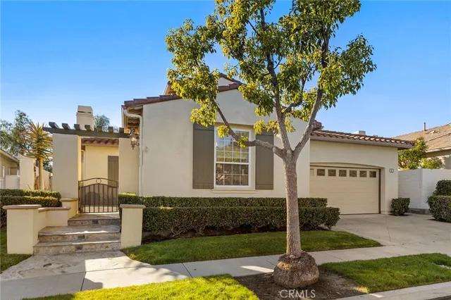 a view of a patio with table and chairs with wooden floor and fence