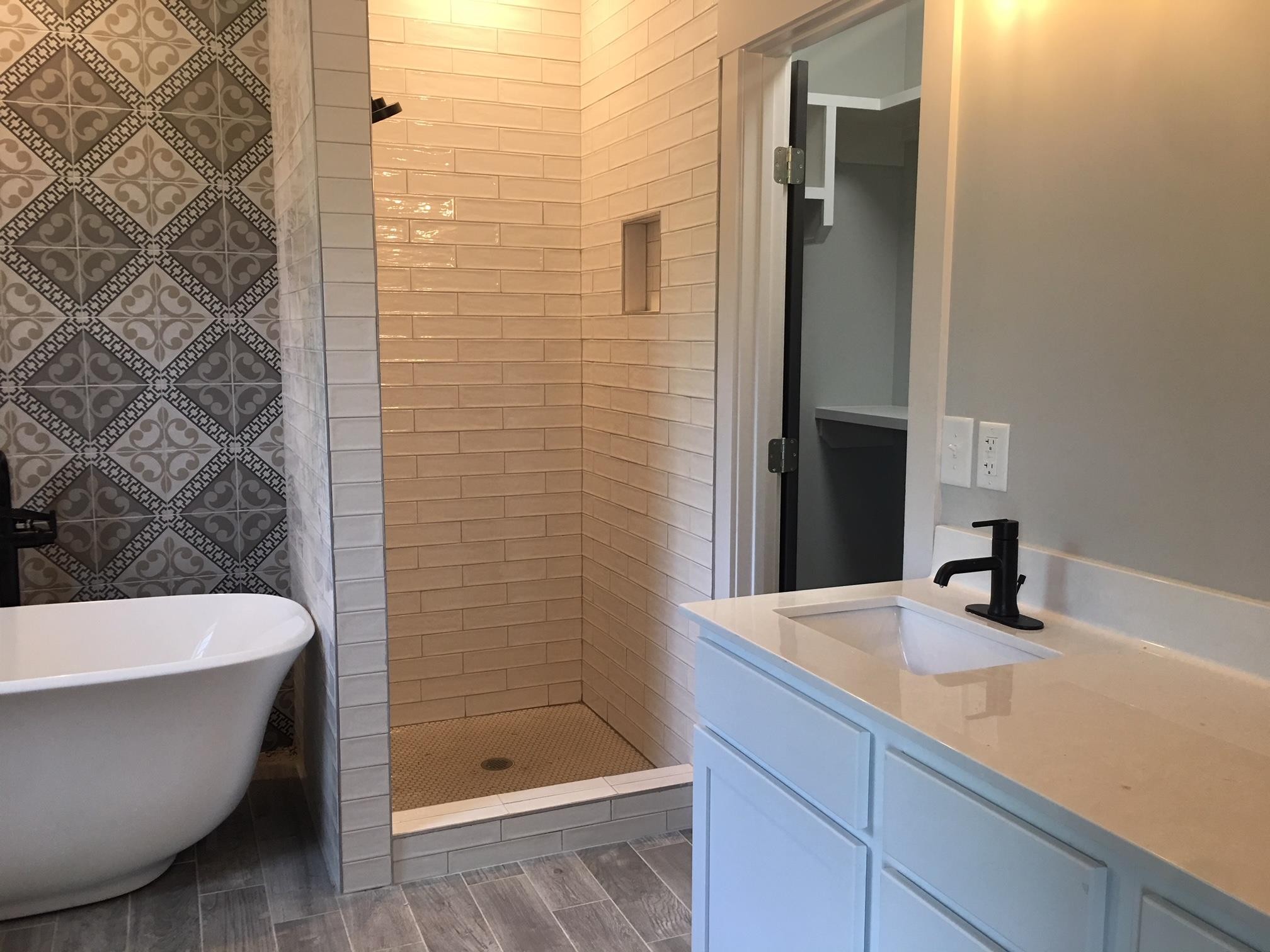 7110 Taylor Road Fairview, TN 37062 - Photo 16 of 23 a bathroom with a sink and shower