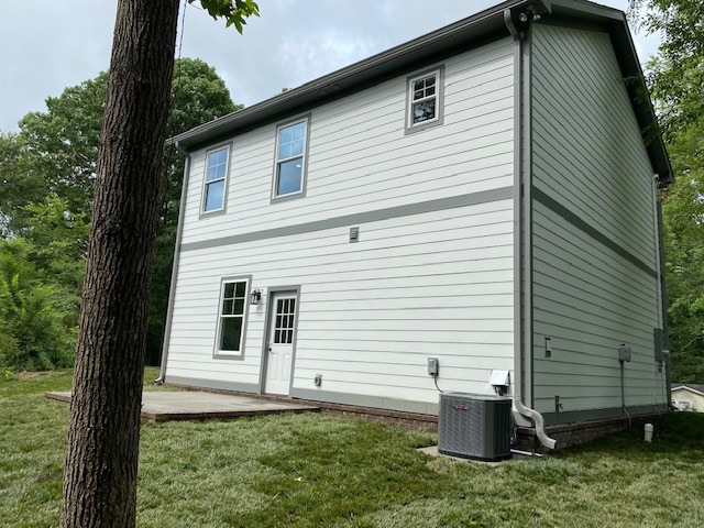 7110 Taylor Road Fairview, TN 37062 - Photo 2 of 23 a view of house with backyard
