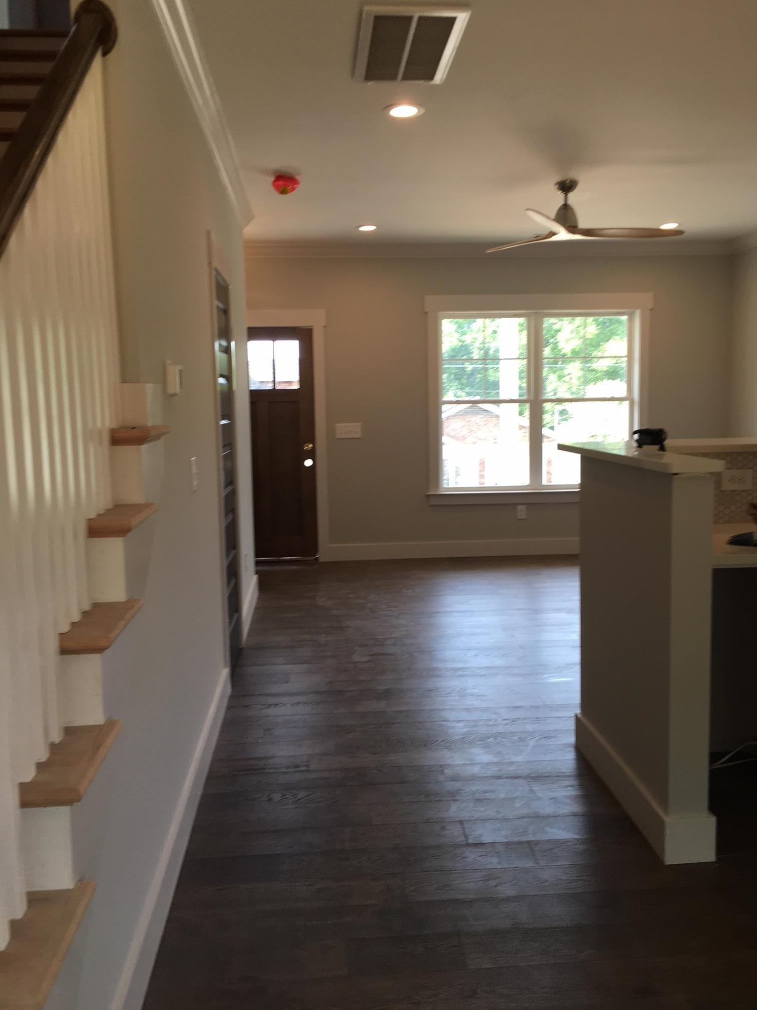 7110 Taylor Road Fairview, TN 37062 - Photo 8 of 23 an empty room with wooden floor and windows