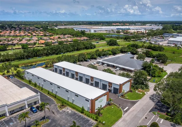 an aerial view of a house with a garden