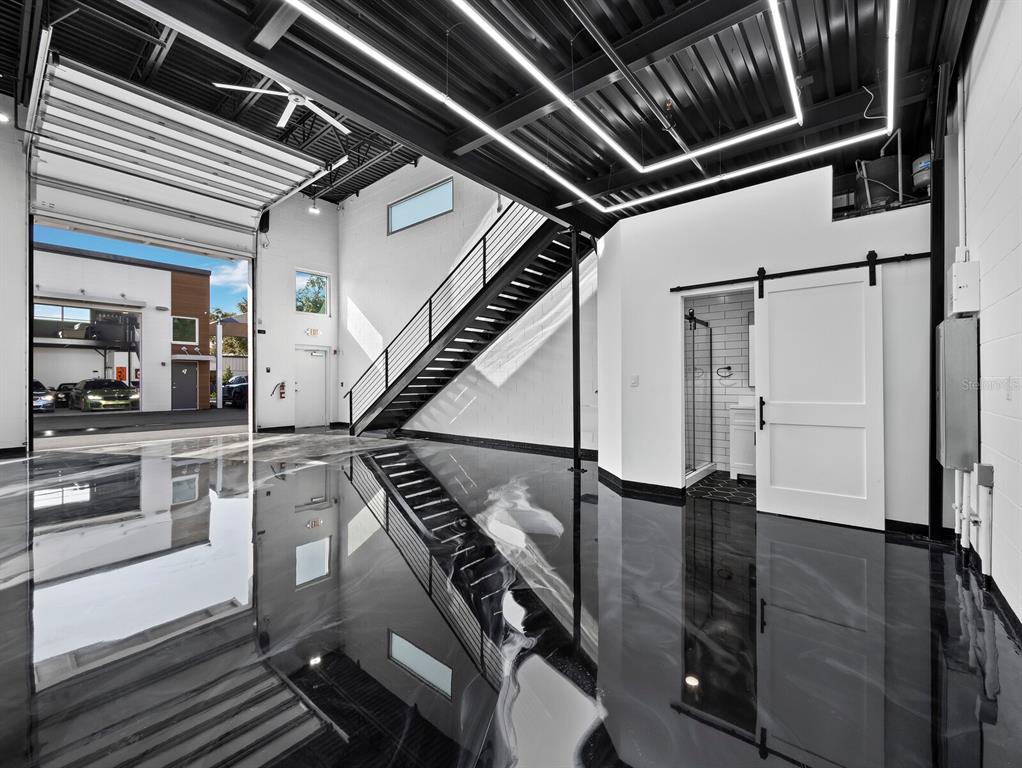 6562 Palmer Park Circle, Unit 18 Sarasota, FL 34238 - Photo 5 of 20 a view of an empty room with wooden floor