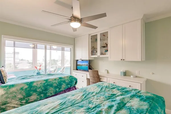 a room with window and furniture