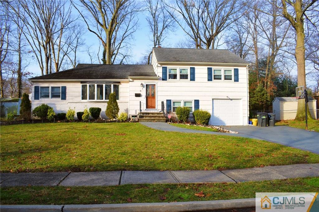3 Timber Road East Brunswick, NJ 08816 - Photo 1 of 21 a front view of a house with a yard
