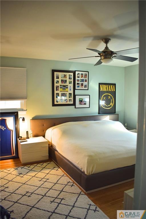 3 Timber Road East Brunswick, NJ 08816 - Photo 16 of 21 a bedroom with a bed and a couch