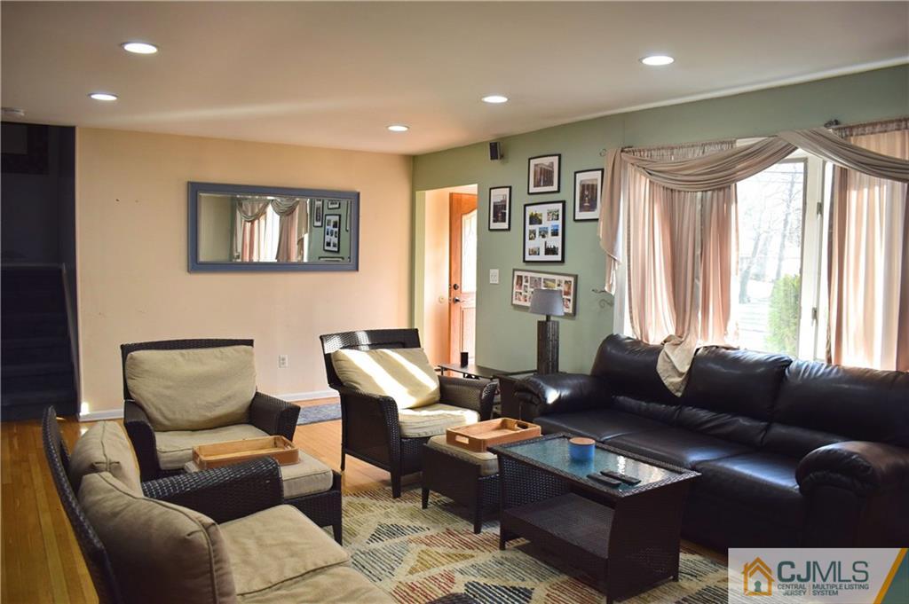3 Timber Road East Brunswick, NJ 08816 - Photo 4 of 21 a living room with furniture and a large window