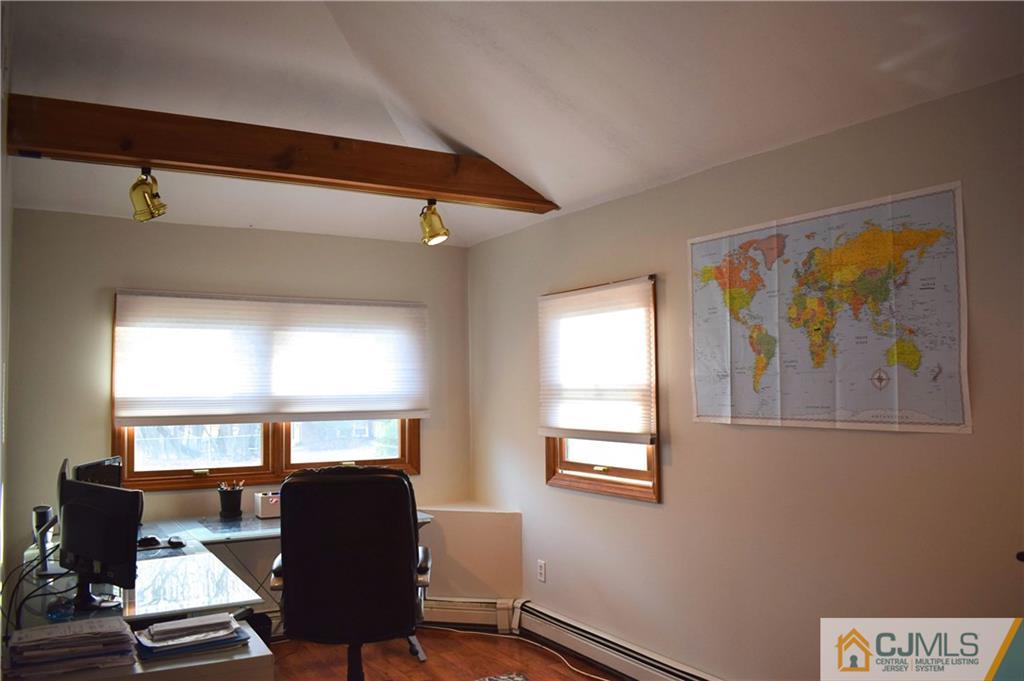 3 Timber Road East Brunswick, NJ 08816 - Photo 8 of 21 a view of a livingroom with furniture and a window