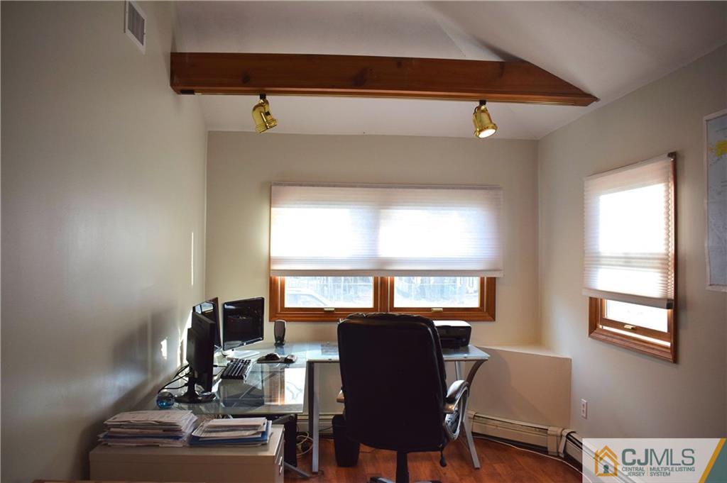 3 Timber Road East Brunswick, NJ 08816 - Photo 9 of 21 a view of a workspace with furniture and a window