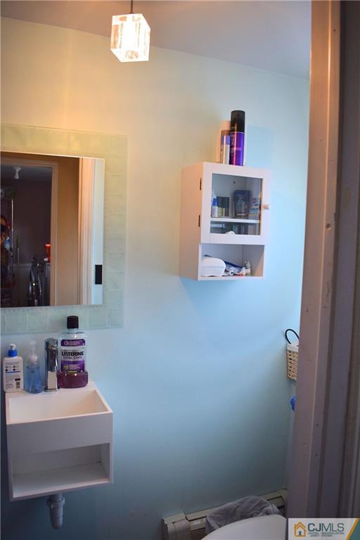 3 Timber Road East Brunswick, NJ 08816 - Photo 10 of 21 a bathroom with a sink and a mirror