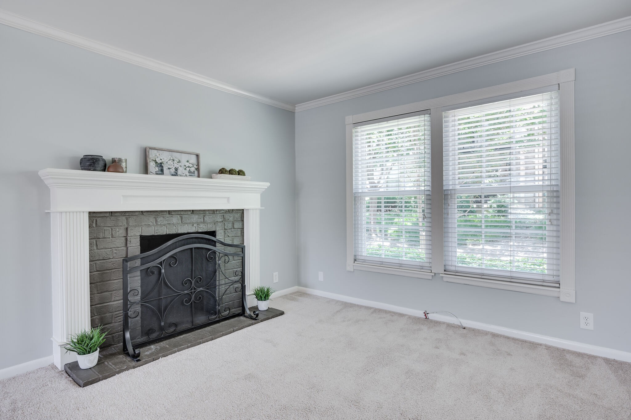 2116 Hobbs Road, Unit M1 Nashville, TN 37215 - Photo 12 of 36 a living room with a fireplace and a window