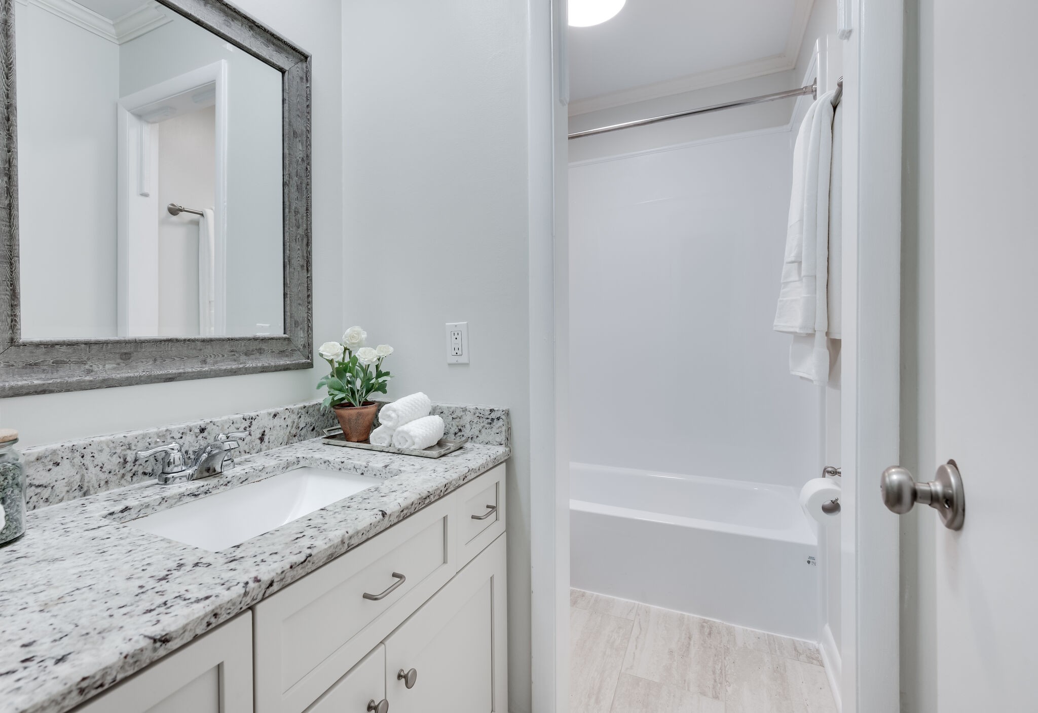 2116 Hobbs Road, Unit M1 Nashville, TN 37215 - Photo 20 of 36 a bathroom with a granite countertop sink and a mirror