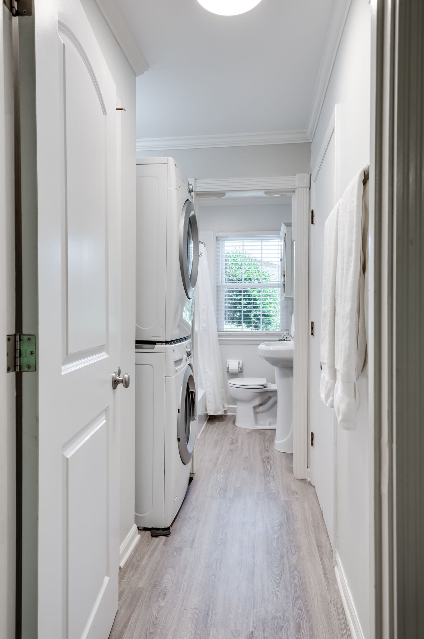 2116 Hobbs Road, Unit M1 Nashville, TN 37215 - Photo 26 of 36 a view of a hallway with bathroom and wooden floor