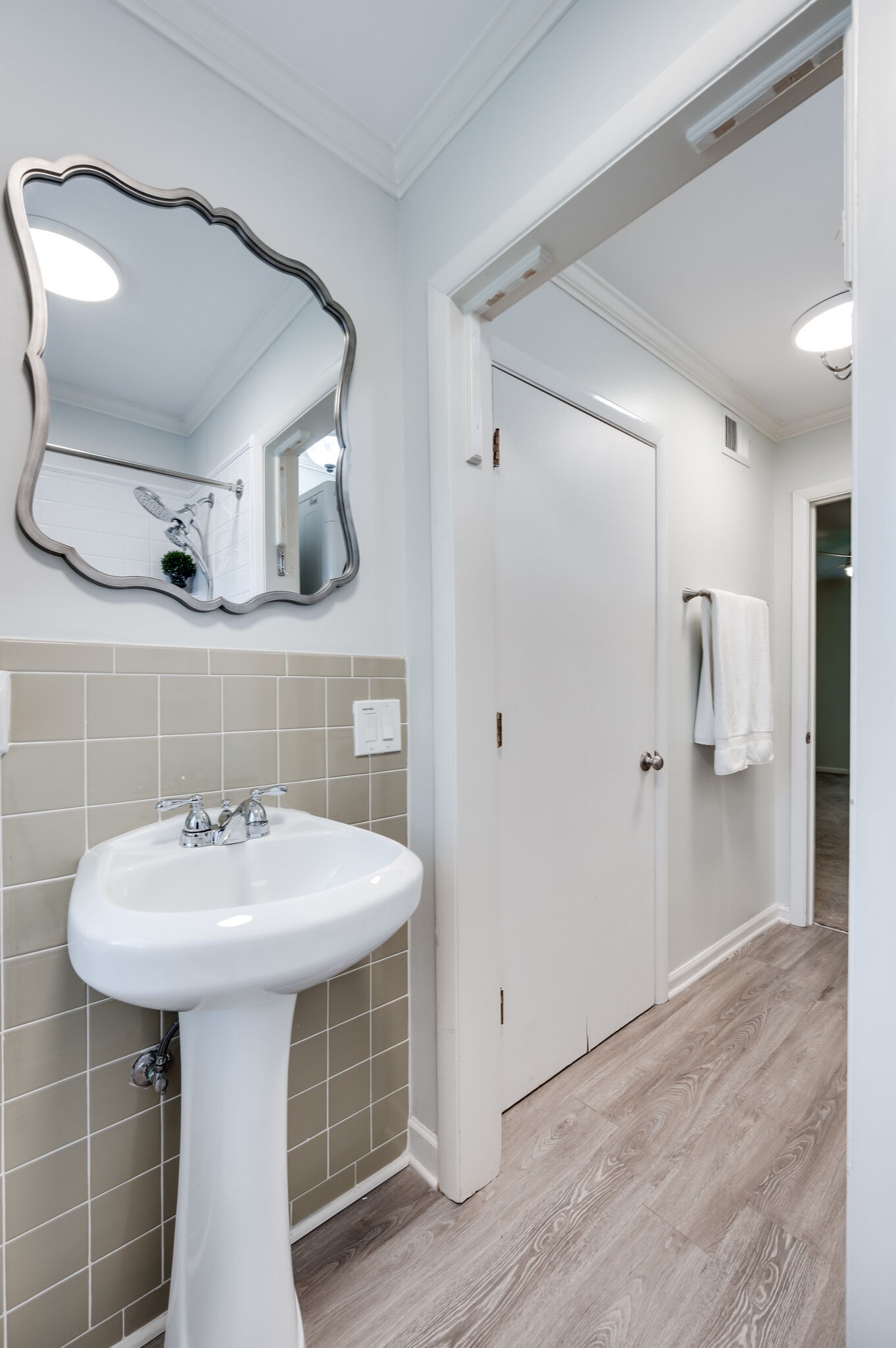 2116 Hobbs Road, Unit M1 Nashville, TN 37215 - Photo 28 of 36 a bathroom with a sink and a mirror