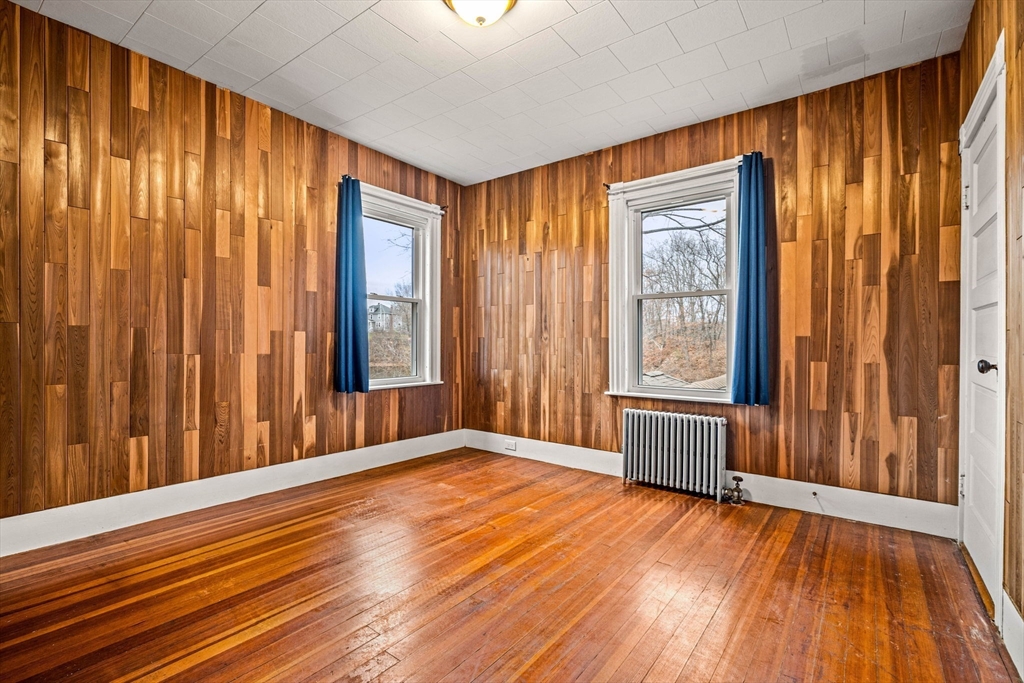 11 Devonshire Street Lawrence, MA 01843 - Photo 19 of 41 a view of a room with wooden floor and walls
