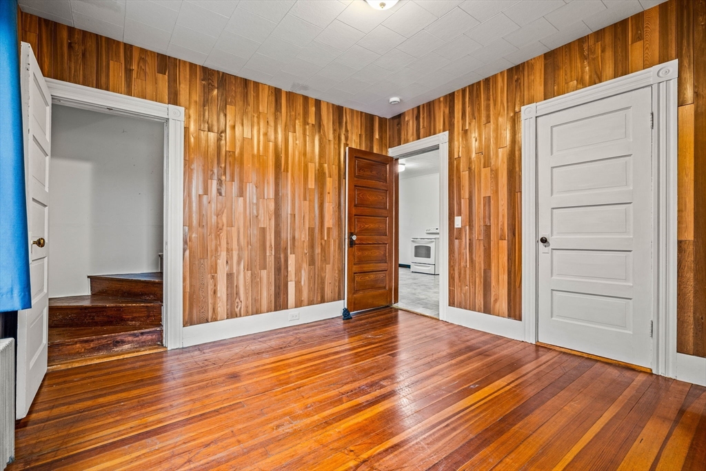 11 Devonshire Street Lawrence, MA 01843 - Photo 20 of 41 wooden floor and windows in a room