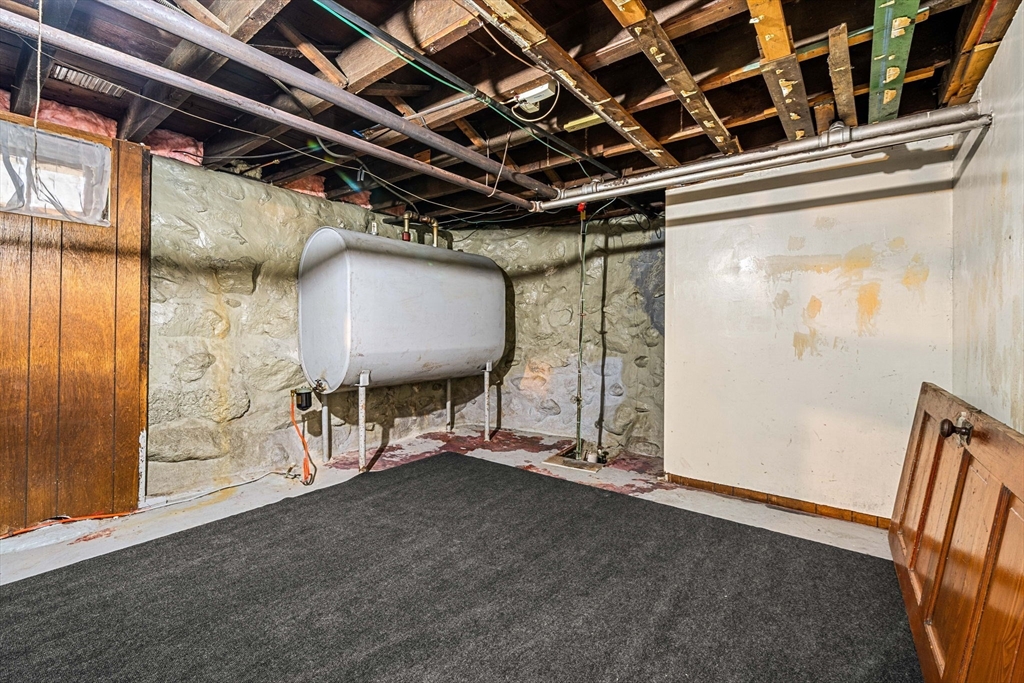 11 Devonshire Street Lawrence, MA 01843 - Photo 27 of 41 a view of an empty room with wooden floor