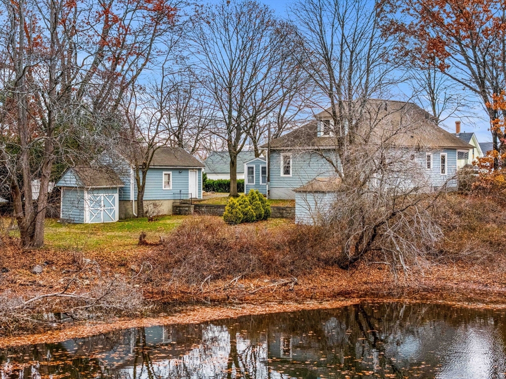 11 Devonshire Street Lawrence, MA 01843 - Photo 38 of 41 a front view of a house with garden