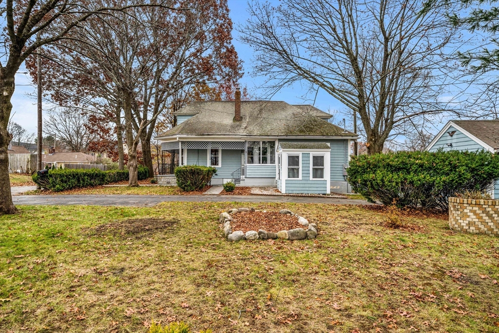 11 Devonshire Street Lawrence, MA 01843 - Photo 39 of 41 a front view of a house with a yard