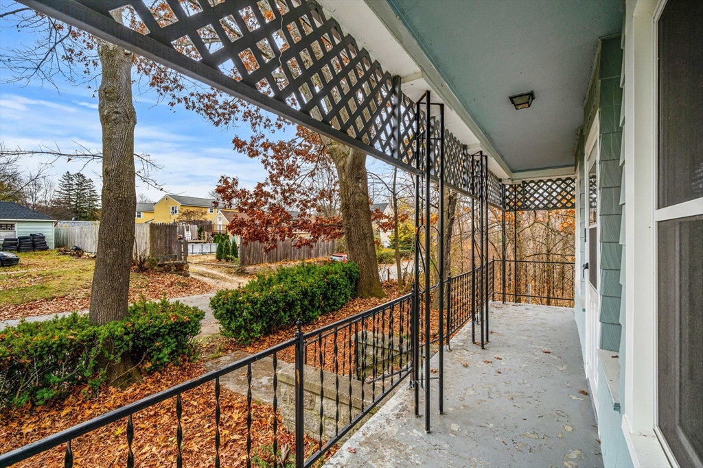 11 Devonshire Street Lawrence, MA 01843 - Photo 4 of 41 a view of balcony with wooden floor