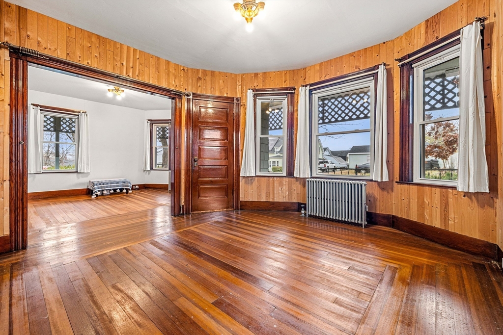 11 Devonshire Street Lawrence, MA 01843 - Photo 6 of 41 a view of an entryway with wooden floor and door