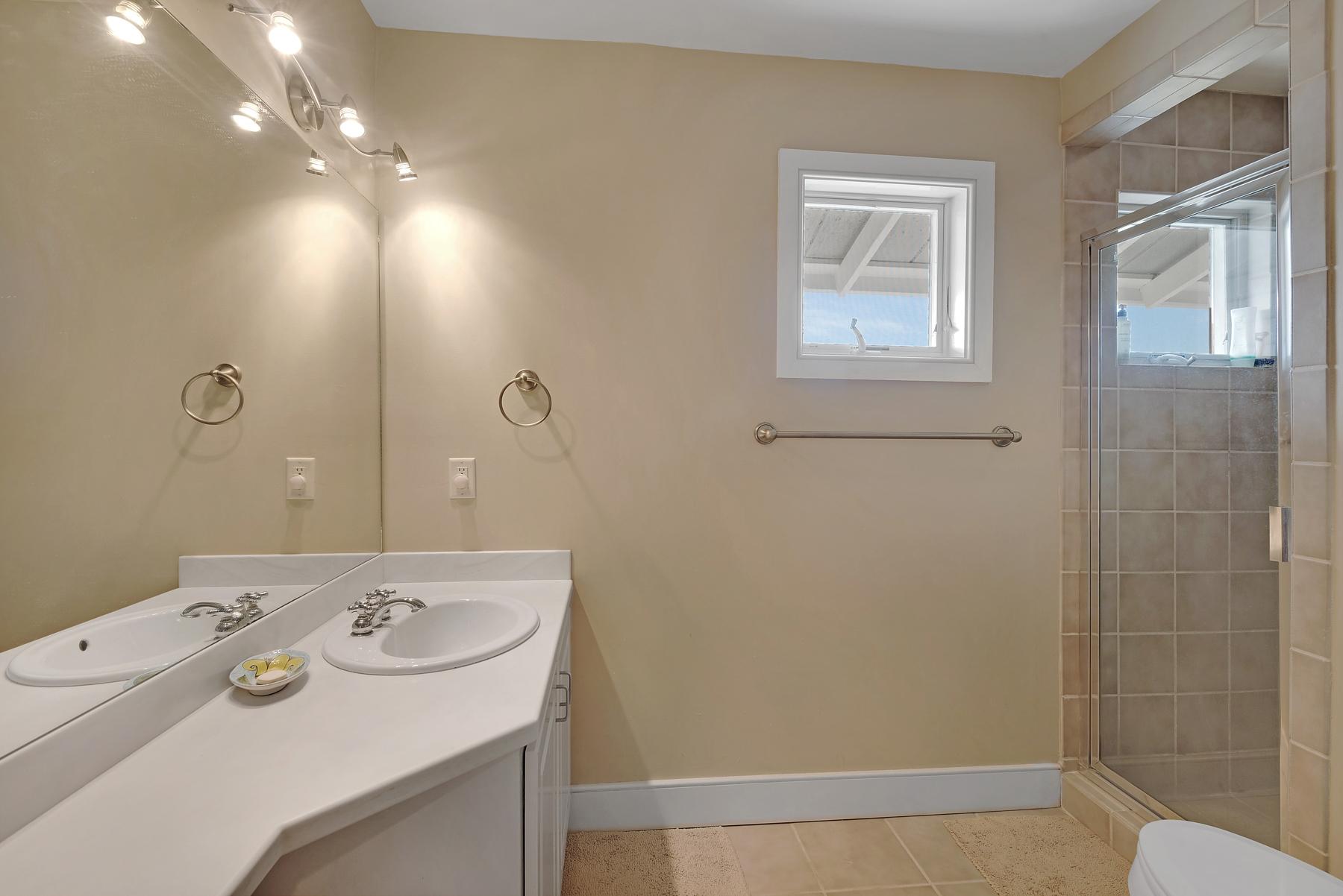 139 Banfill Road Santa Rosa Beach, FL 32459 - Photo 32 of 46 a bathroom with a sink a toilet and shower