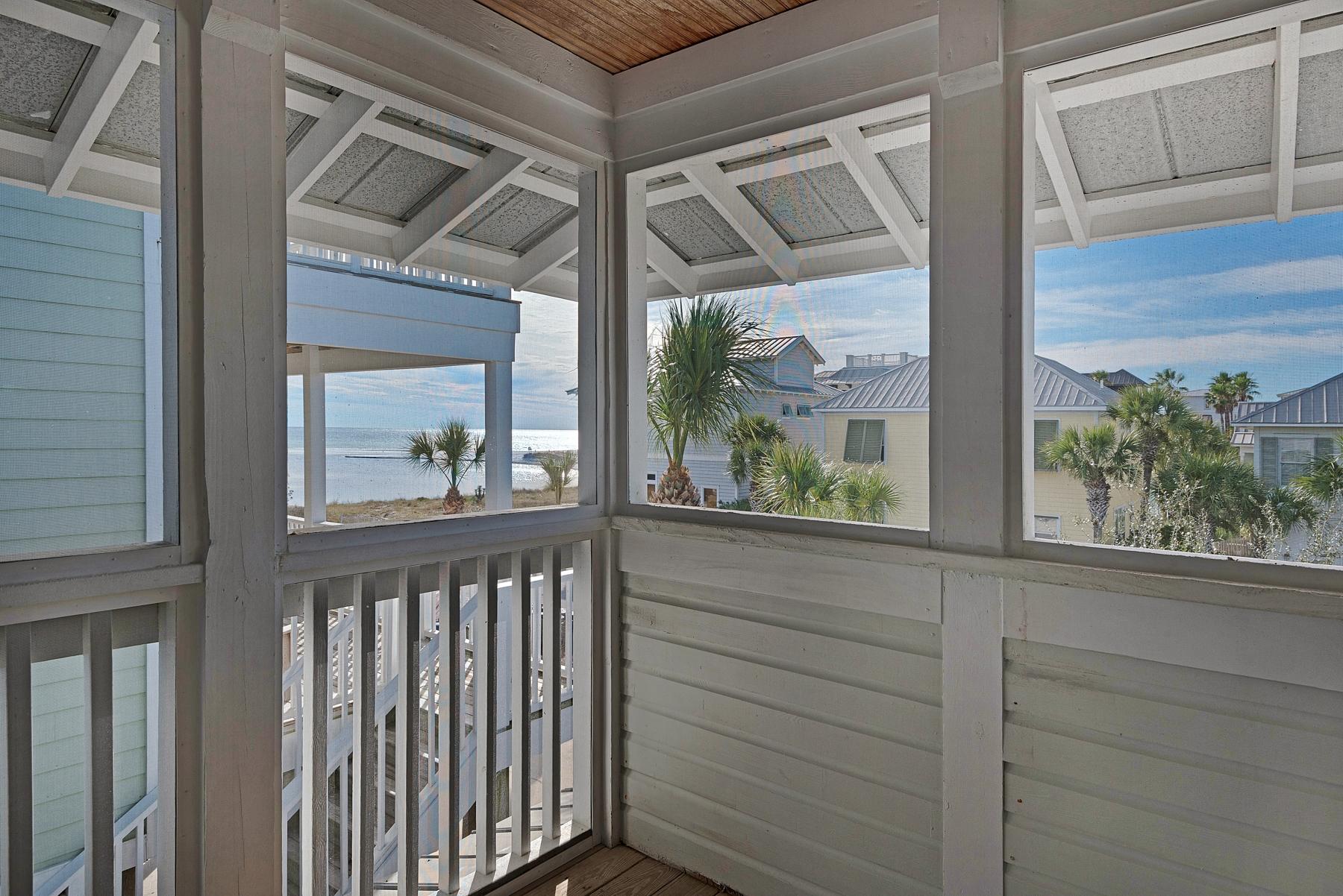 139 Banfill Road Santa Rosa Beach, FL 32459 - Photo 33 of 46 a view of a porch with a wooden door