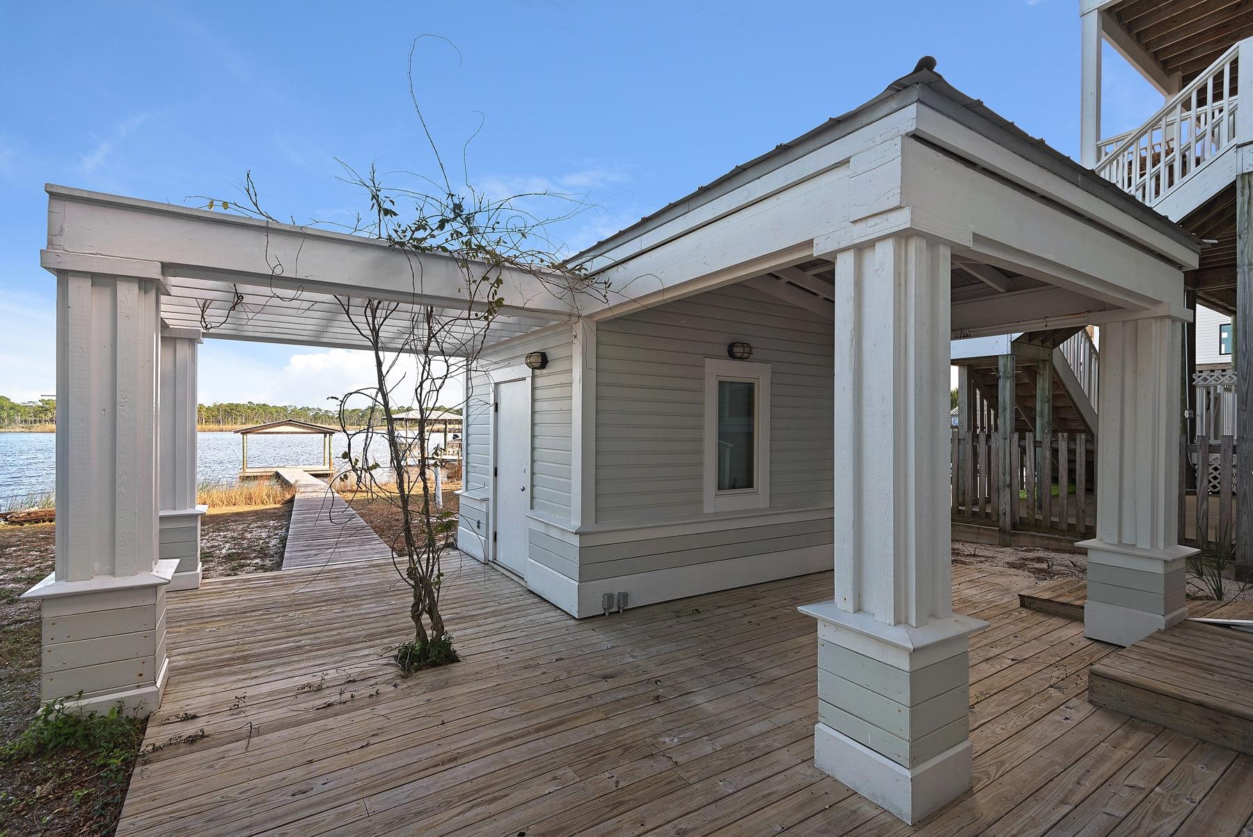 139 Banfill Road Santa Rosa Beach, FL 32459 - Photo 39 of 46 a front view of a house with a porch