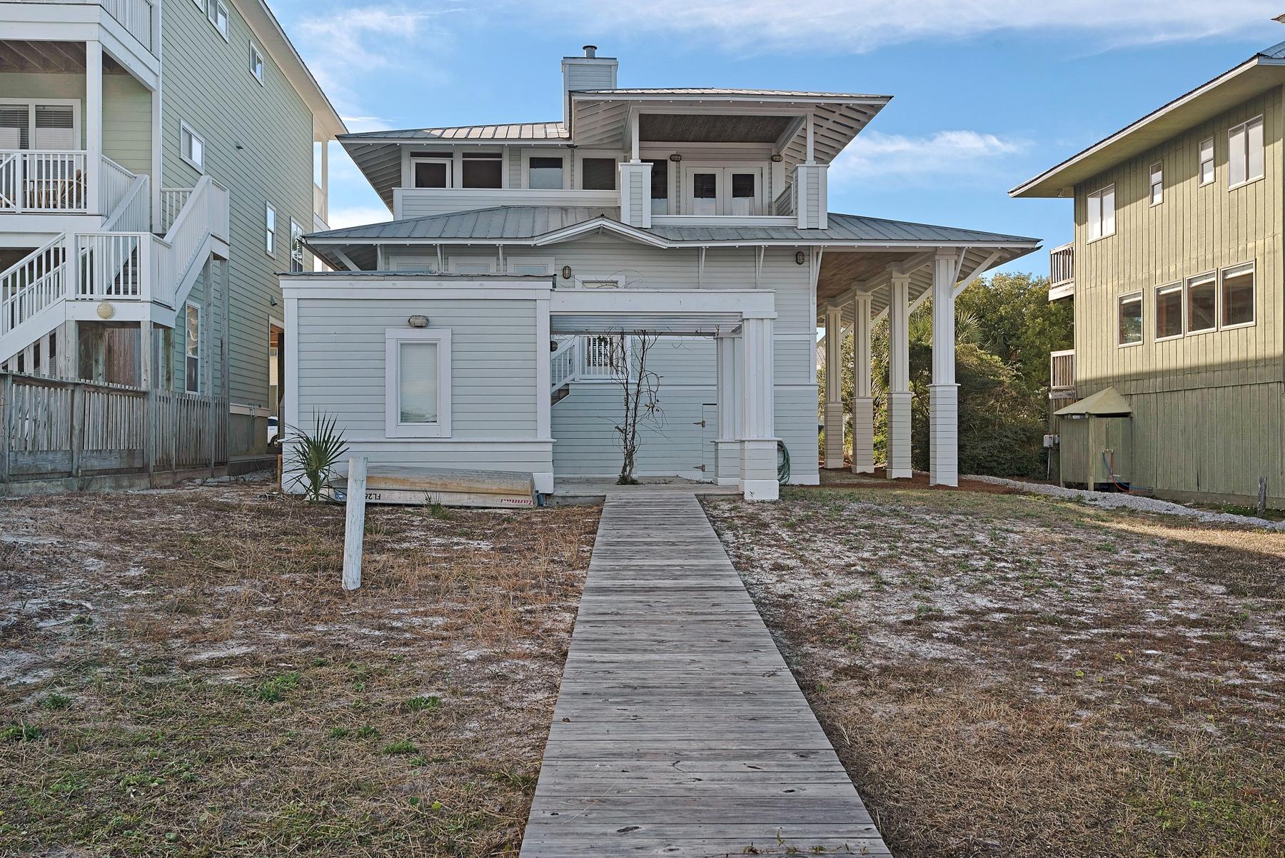 139 Banfill Road Santa Rosa Beach, FL 32459 - Photo 41 of 46 a front view of a house with a yard