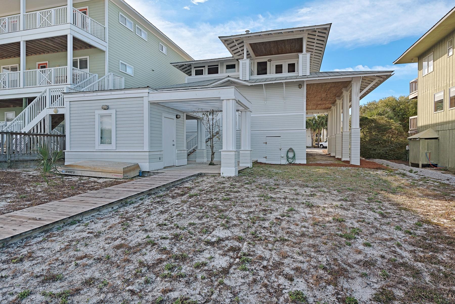 139 Banfill Road Santa Rosa Beach, FL 32459 - Photo 42 of 46 a front view of a house with a yard
