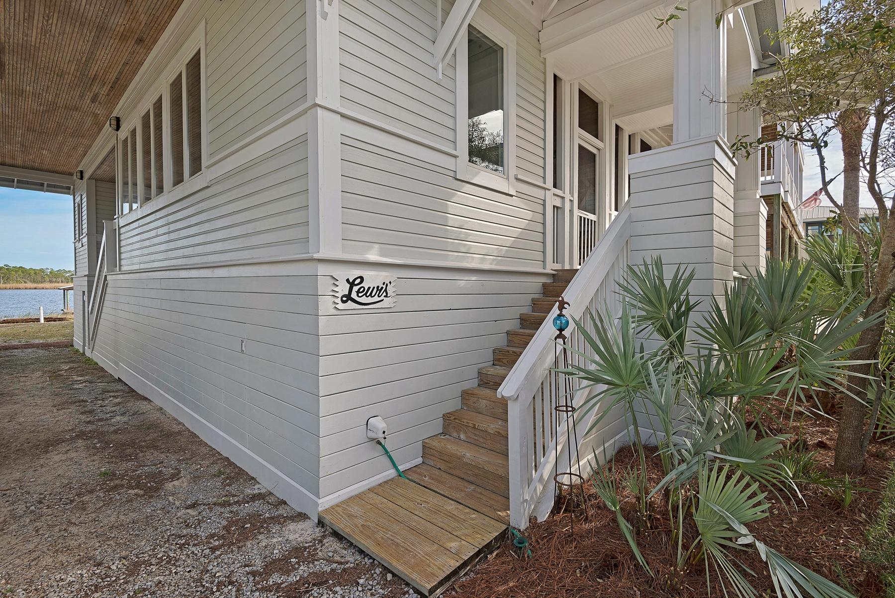 139 Banfill Road Santa Rosa Beach, FL 32459 - Photo 9 of 46 a view of a house with a yard