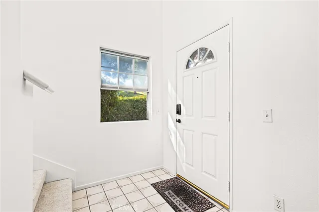 a view of an entryway with hallway