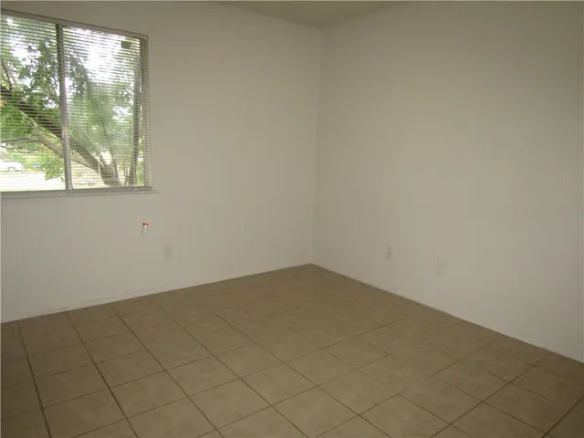 a view of a balcony with chairs