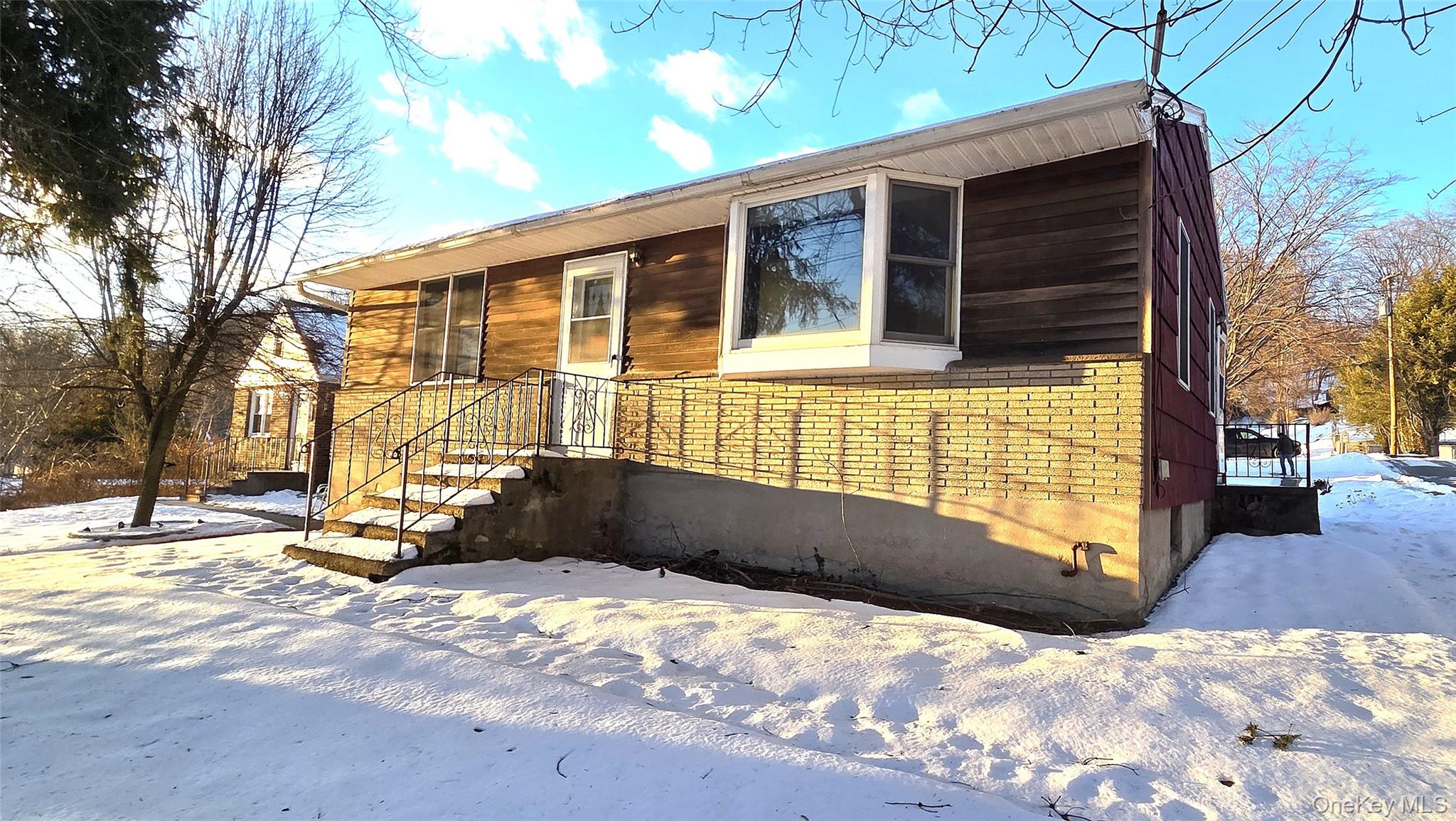 1716 A Main Street Peekskill, NY 10566 - Photo 2 of 13 a front view of a house with a yard